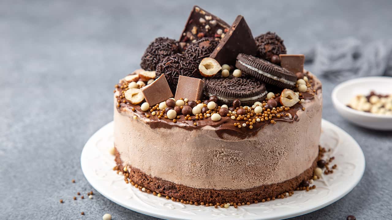 CHEESECAKE CON CIOCCOLATO, CARAMELLO E FRUTTA SECCA